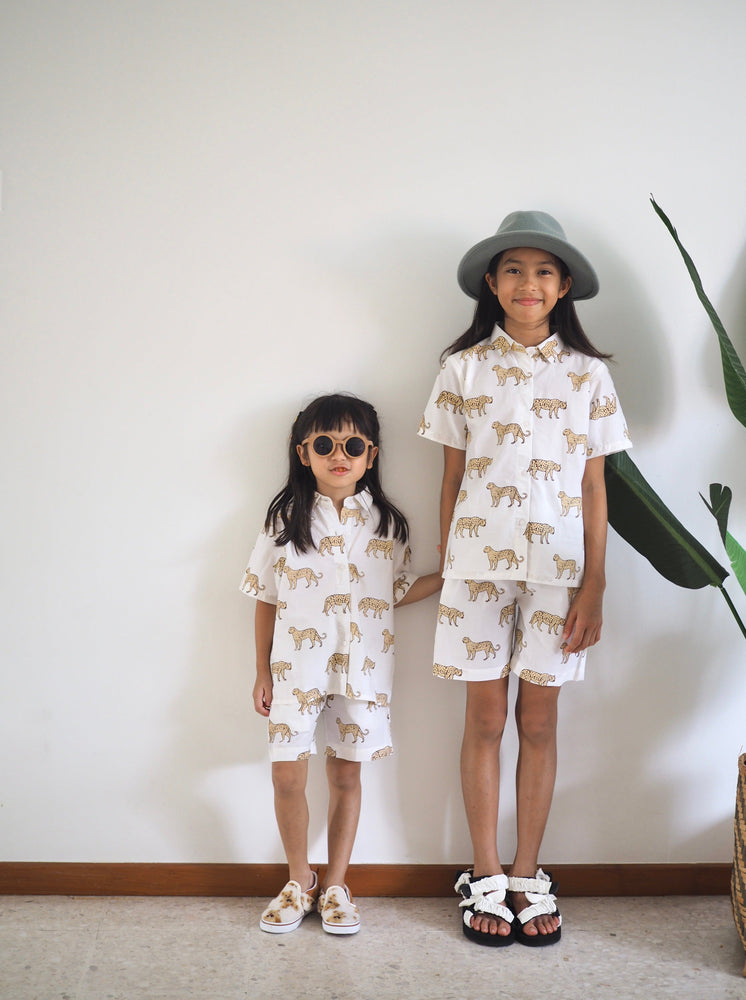 
                  
                    Jungle resort set, resort, twinning set, matching shirt and shorts, jaedals, sandals, lepoard print, kids and adults , baebeeboo, social conscious
                  
                