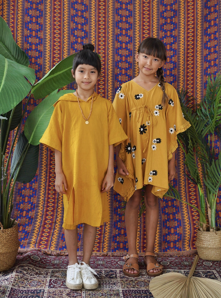 
                  
                    resort kids fashion, kids fashion, resort wear, kaftan, tunic, caftan, daisy boo, daisy, mustard, hooded, oversize hood, unisex
                  
                