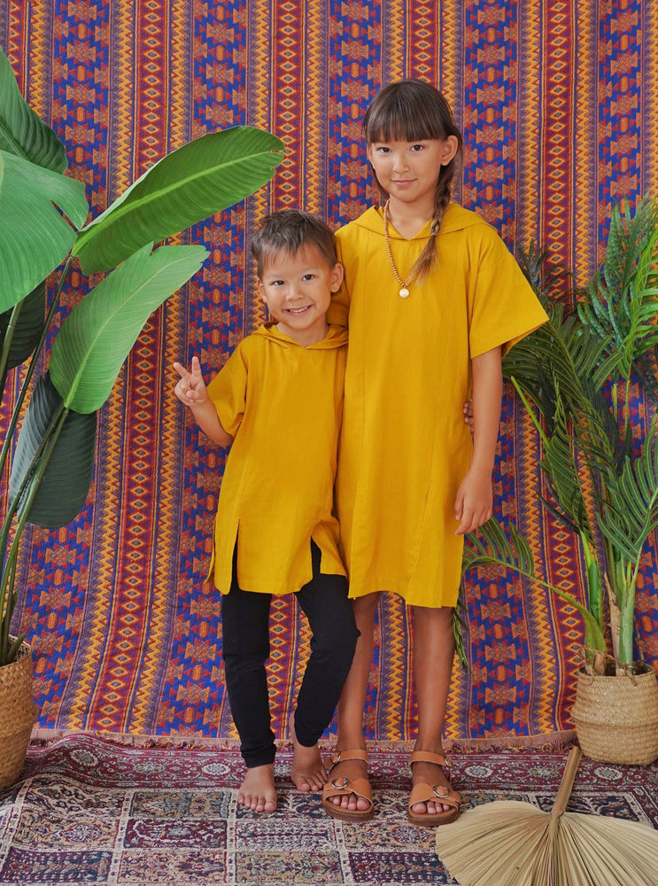 
                  
                    resort kids fashion, kids fashion, resort wear, kaftan, tunic, caftan, daisy boo, daisy, mustard, hooded, oversize hood, unisex
                  
                