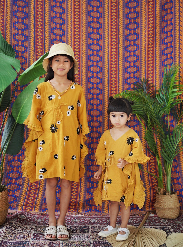 resort kids fashion, kids fashion, resort wear, kaftan, tunic, caftan, daisy boo, daisy, mustard, frills, give back