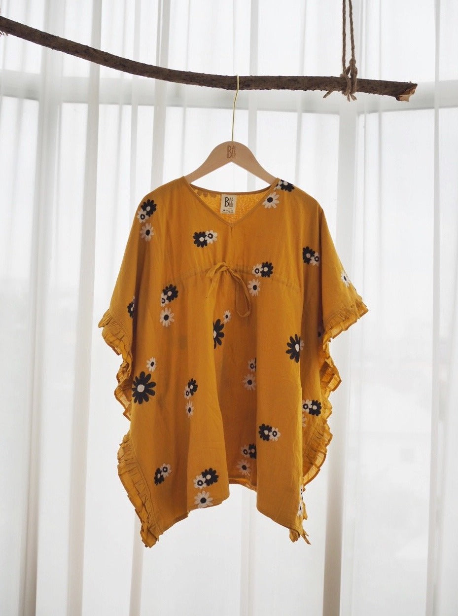 
                  
                    resort kids fashion, kids fashion, resort wear, kaftan, tunic, caftan, daisy boo, daisy, mustard, frills, give back
                  
                