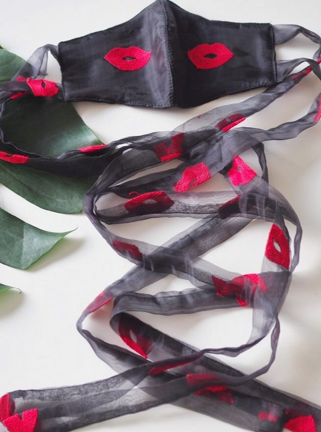 
                  
                    Black Kisses Face Mask
                  
                