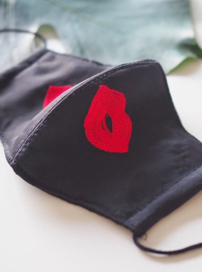 
                  
                    Black Kisses Face Mask
                  
                