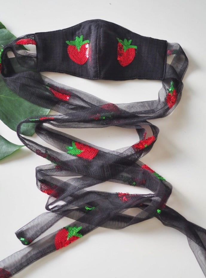 
                  
                    Shiny Strawberry Black Face Mask
                  
                