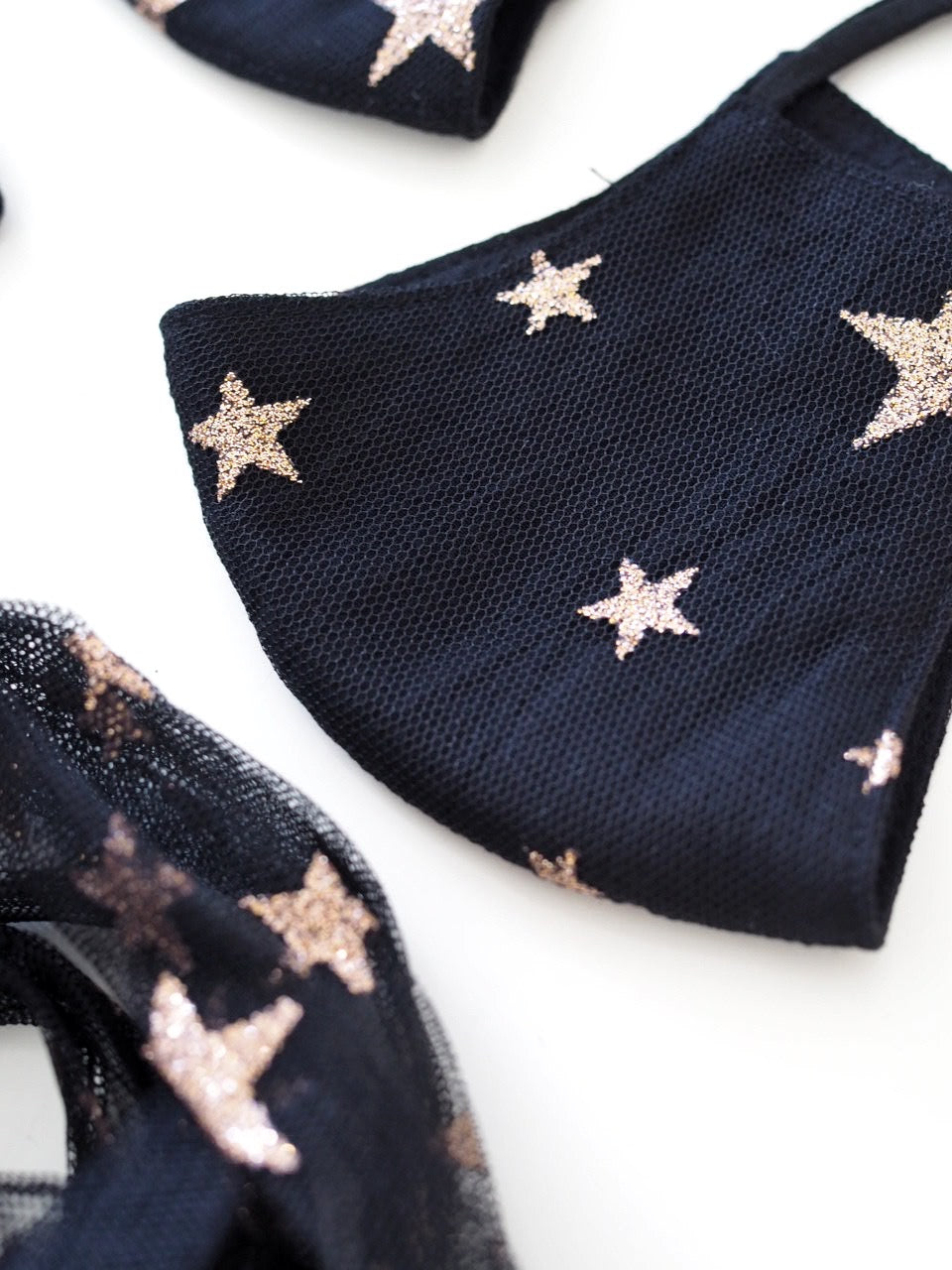 
                  
                    Star Light Black Face Mask
                  
                