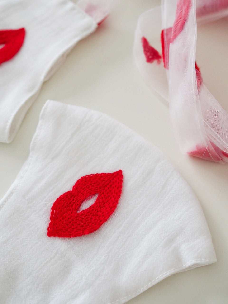 
                  
                    White Kisses Face Mask
                  
                