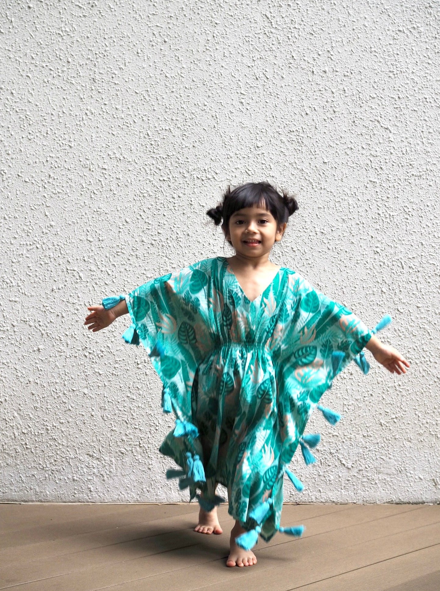 
                  
                    monstera, green, kaftan, kids, kids kaftan, tassels, boho, boho kids, tunic,
                  
                